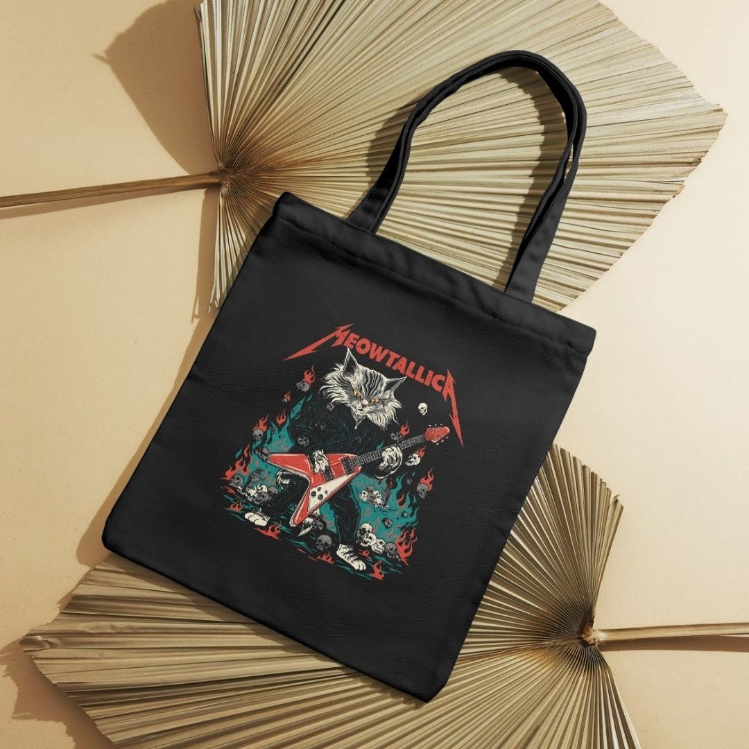 Tote bag preta Meowtallica com gato a tocar guitarra elétrica vermelha